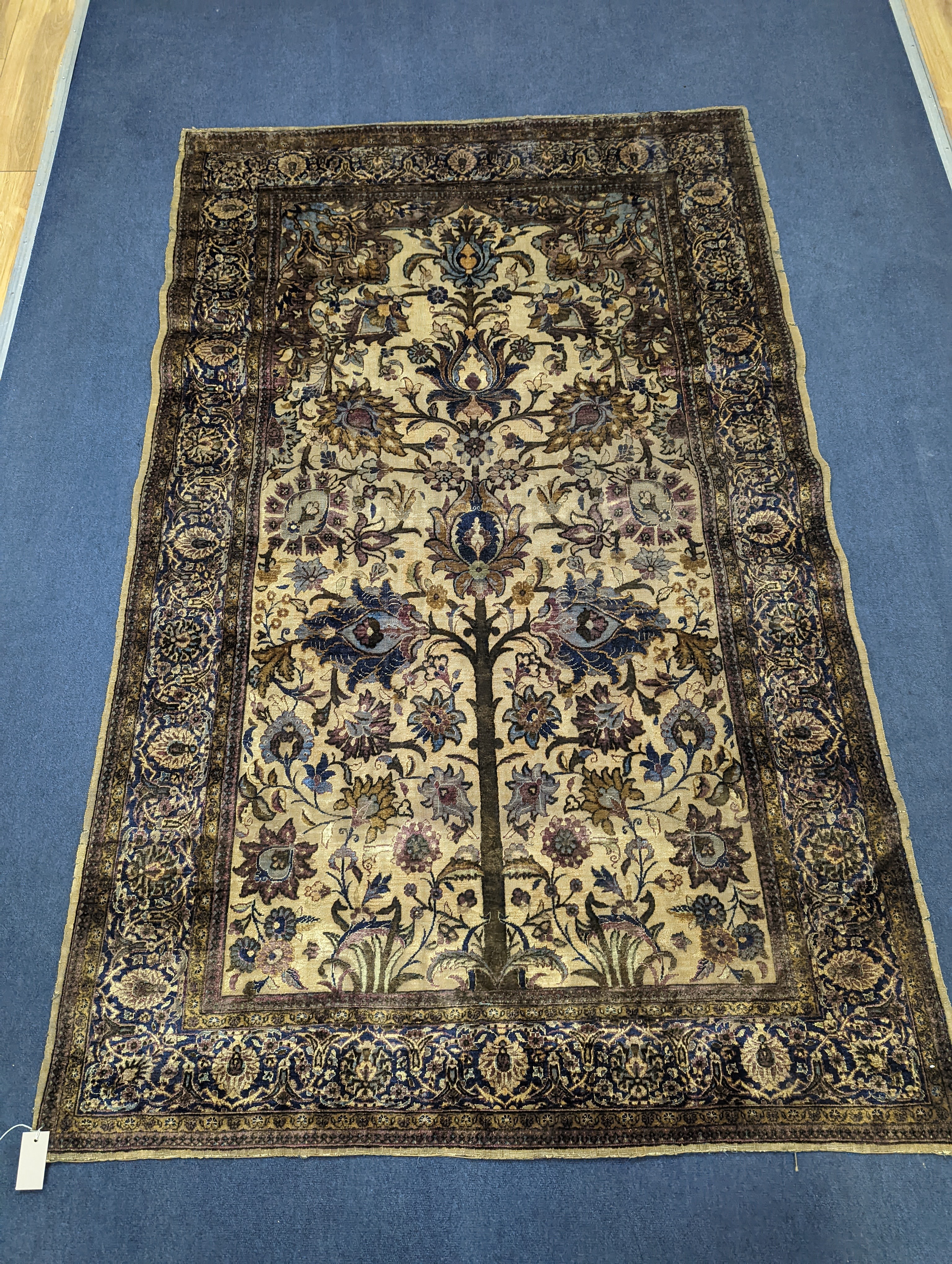 A Persian tree of life silk rug, 206 x 128cm